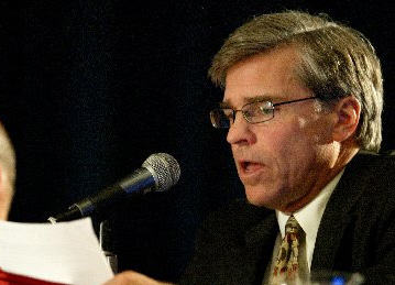 City manager Bill Lindsay, right, speaks before Richmond residents and homeowners during a city council meeting at Richmond Memorial Auditorium in