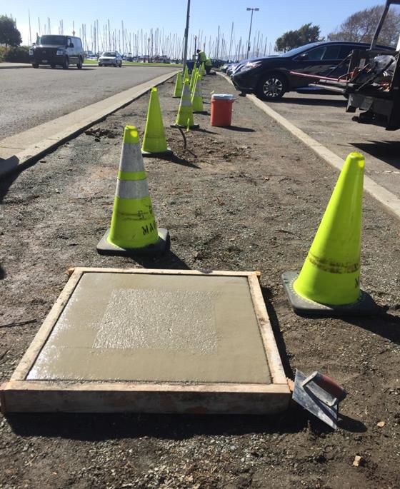 Concrete pad for garbage cans (Marina)