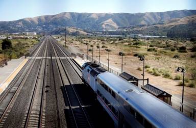 A rare expanse of barren land north of San Bruno Mountain is seen from the pedestrian bridge of the Bayshore Caltrain Station in Brisbane, Calif., Monday afternoon, July 25, 2016. A huge redevelopment proposal, the Brisbane Baylands, would develop the 684-acre property in in northern San Mateo County west of Highway 101. (Karl Mondon/Bay Area News Group)