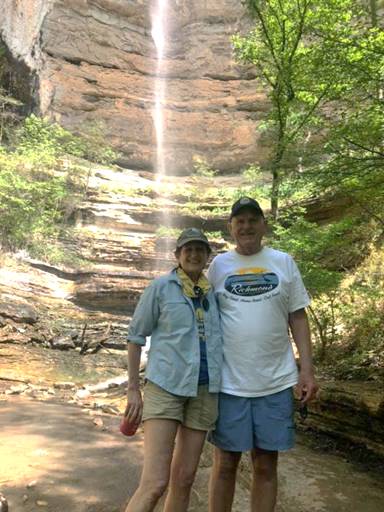 Image may contain: 2 people, including Tom Butt, people smiling, people standing, outdoor and nature