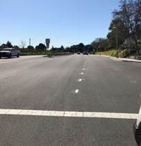 Detail 40 striping installed SB on Marina Bay Parkway at Jetty Dr