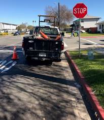 Stop Sign reset at the Southwest corner of Macdonald Ave